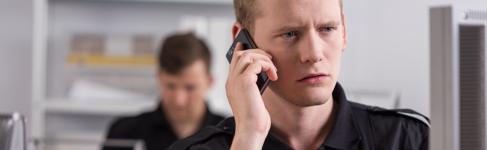 Man taking urgent phone call from incarcerated family member