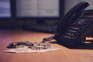 Landline phone on a table, ready for an urgent call—symbolizing a collect call from jail.